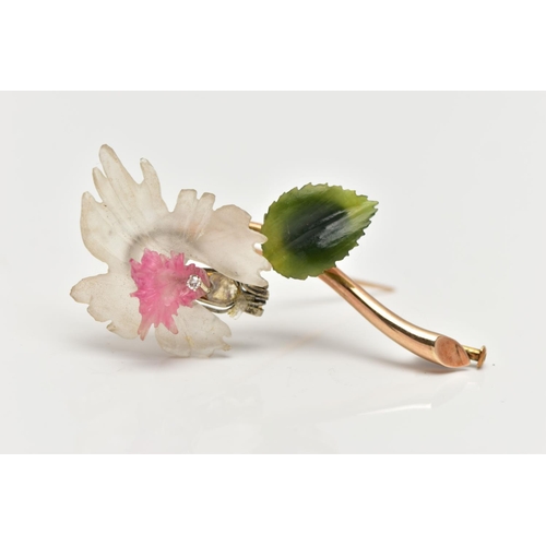 62 - A 'JULIUS HUGLER' FLORAL BROOCH, a 14ct yellow gold stem, leading onto a carved frosted rock crystal... 