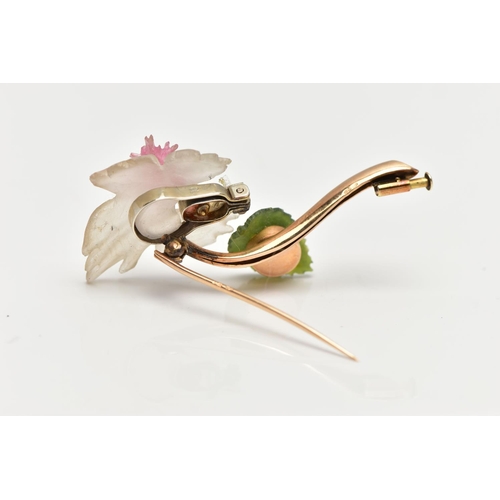 62 - A 'JULIUS HUGLER' FLORAL BROOCH, a 14ct yellow gold stem, leading onto a carved frosted rock crystal... 