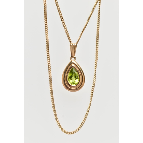 65 - A 9CT GOLD PERIDOT PENDANT NECKLACE, the pendant of a pear drop shape, collet and claw set pear cut ... 