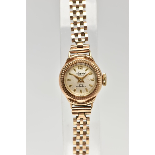 7 - A LADIES 9CT GOLD 'ACCURIST' WRISTWATCH, manual wind, round silver dial signed 'Accurist, 21 jewels,... 