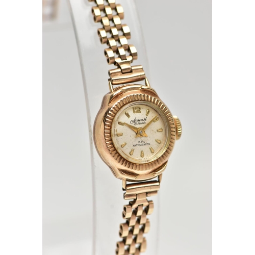 7 - A LADIES 9CT GOLD 'ACCURIST' WRISTWATCH, manual wind, round silver dial signed 'Accurist, 21 jewels,... 