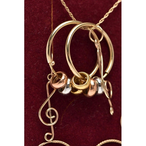 80 - A PAIR OF HOOP EARRINGS, A PENDANT NECKLACE AND MATCHING EARRINGS, the polished yellow metal hollow ... 