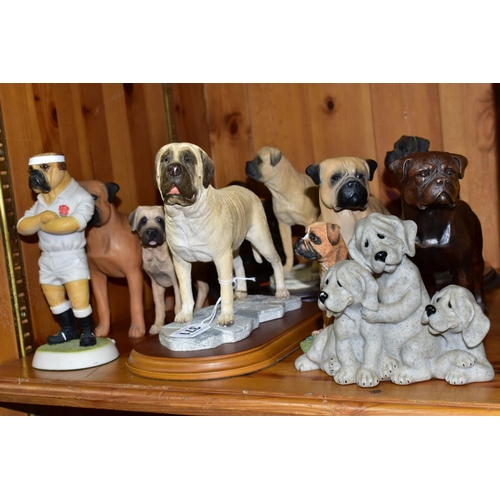 371 - A COLLECTION OF BULL MASTIFF DOG FIGURINES, comprising a bronzed effect figure of a girl reading to ... 