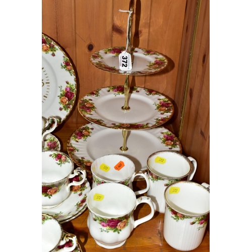 372 - A ROYAL ALBERT 'OLD COUNTRY ROSES' PATTERN PART TEA SET,  comprising a three tier cake stand (bottom... 