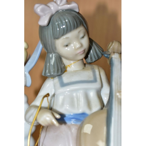 377 - A NAO DISNEY COLLECTION 'DREAMING OF TINKERBELL' FIGURE, depicting a sleeping child with book and Ti... 