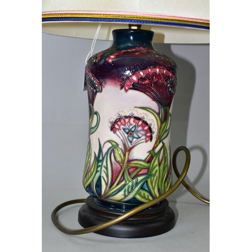 392 - A MOORCROFT POTTERY 'GYPSY' PATTERN TABLE LAMP, of waisted cylindrical form, tube lined with intrica... 