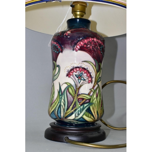 392 - A MOORCROFT POTTERY 'GYPSY' PATTERN TABLE LAMP, of waisted cylindrical form, tube lined with intrica... 