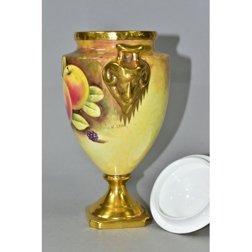 394 - A COALPORT PEDESTAL COVERED VASE, of urn form hand painted with fruit, signed N (Norman) Lear, gilt ... 