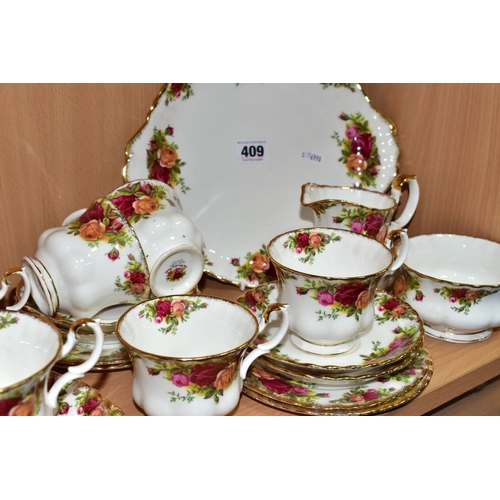 409 - A TWENTY ONE PIECE ROYAL ALBERT OLD COUNTRY ROSES PART TEA SET, comprising a cream jug, a sugar bowl... 