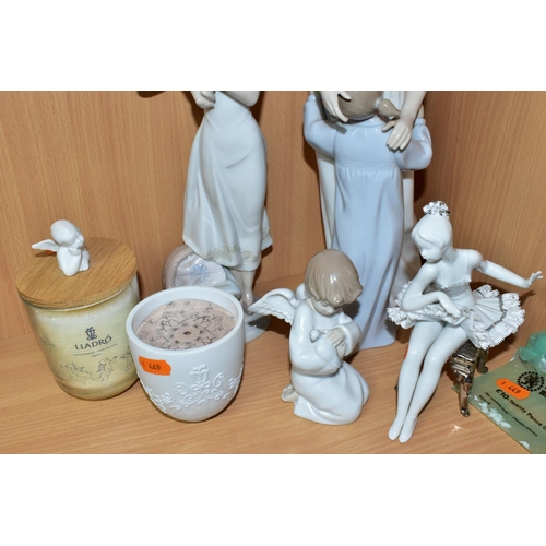 413 - A GROUP OF LLADRO FIGURINES AND CANDLES, comprising four figurines: 'Loving Protection' 8245 sculpto... 