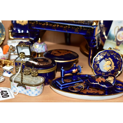 420 - A COLLECTION OF LIMOGES PORCELAIN ITEMS, to include a Dubarry Limoges porcelain basket containing th... 