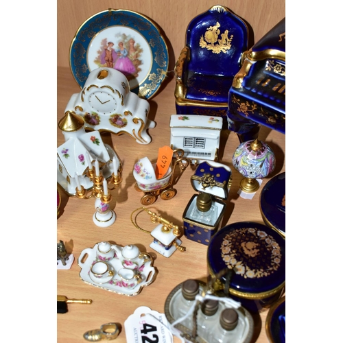 420 - A COLLECTION OF LIMOGES PORCELAIN ITEMS, to include a Dubarry Limoges porcelain basket containing th... 