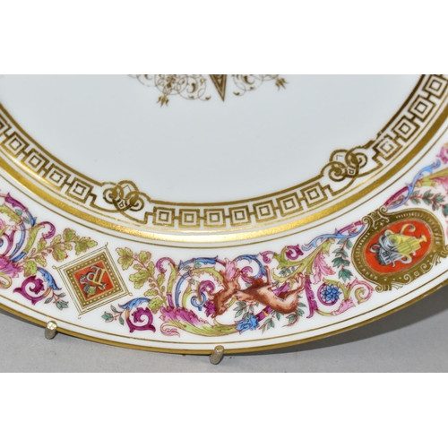 421 - A SEVRES PORCELAIN DESSERT PLATE, from the Royal Hunting Service, featuring a scrolling border surro... 