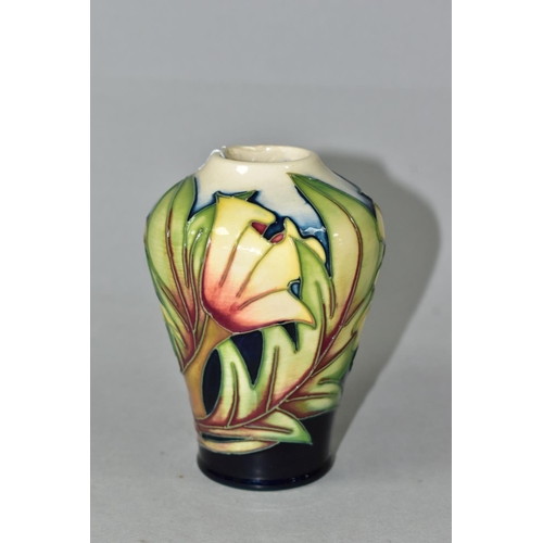 423 - A MOORCROFT POTTERY 'ODE TO MAY' VASE, the shouldered vase, in Ode to May pattern by Sian Leeper, de... 