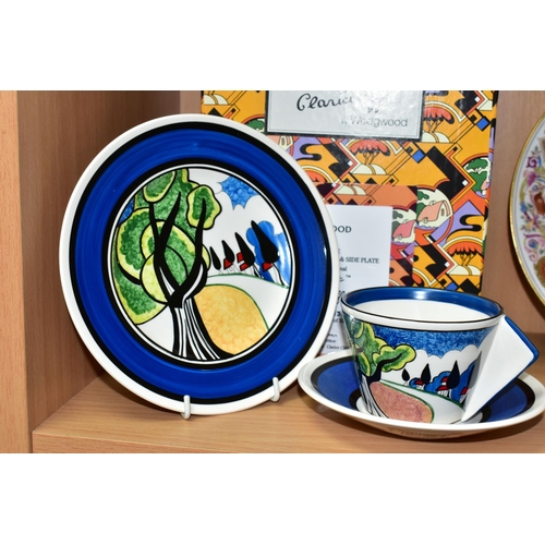 424 - A BOXED WEDGWOOD CLARICE CLIFF LIMITED EDITION 'MAY AVENUE' CONICAL TEACUP, SAUCER AND SIDE PLATE, b... 