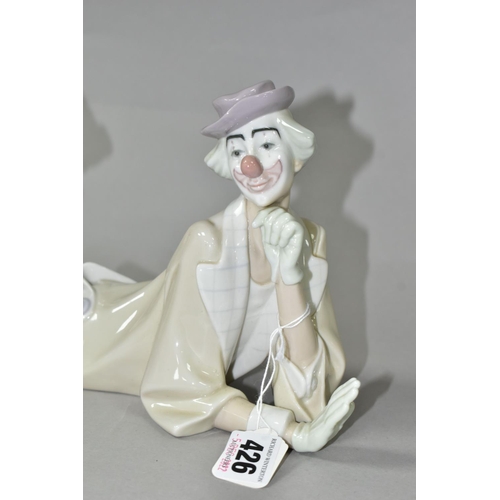 426 - A LLADRO CLOWN, no 4618, designed by Salvador Furio in 1970, the figure lying on his front with head... 