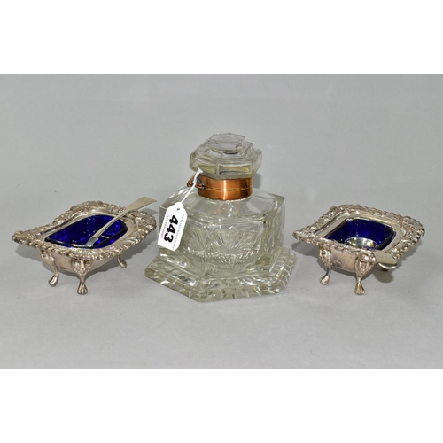 443 - A PAIR OF SALTS WITH SILVER SPOONS AND A LARGE GLASS INKWELL, comprising two silver salt spoons by W... 