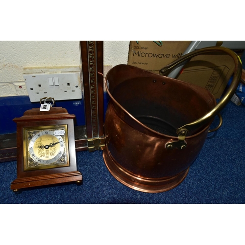 491 - A MAPPIN & WEBB  MANTEL CLOCK TOGETHER WITH A 20TH CENTURY COPPER FENDER, and a copper and brass coa... 