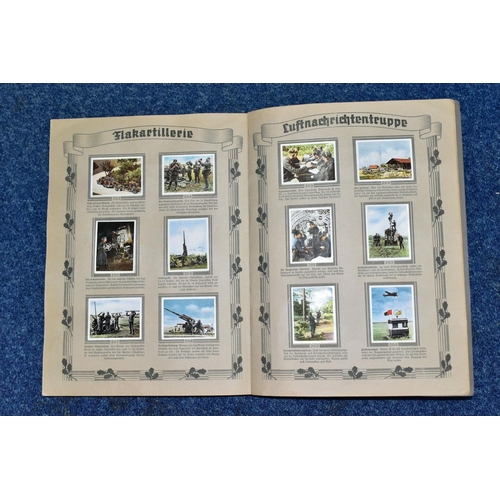 518 - DIE DEUTSCHE WEHRMACHT, one descriptive album containing 270 cigarette cards in colour, the original... 