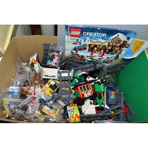 534 - TWO BOXES OF LEGO TRACK AND CREATOR, to include two  boxed sets of Lego Creator 'Expert' 10254 Winte... 