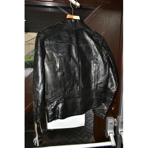 536 - A BLACK LEATHER PIN BADGE BIKER'S JACKET, size small, Frank N Furter style, with sixteen metal pin b... 