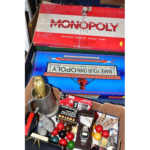 552 - FOUR BOXES OF JAMES BOND VIDEOS AND ASSORTED SUNDRIES, to include a set of Monopoly, a boxed Beltime... 