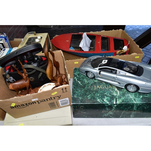 567 - A MAISTO DIE CAST MODEL OF A JAGUAR XJ220,  1/12th scale complete with box and display stand, approx... 