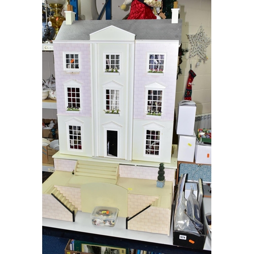 574 - A MODERN FURNISHED DOLLS HOUSE WITH ACCESSORIES ETC, to include a Wentworth Court house 1536i fitted... 