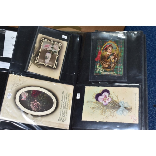 501 - POSTCARDS, four albums containing approximately 625 Sentimental Postcards dating from The Victorian ... 