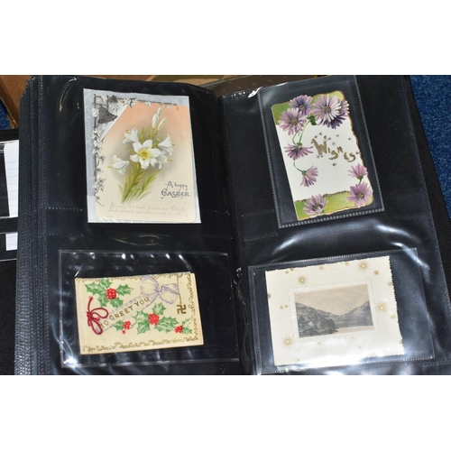 501 - POSTCARDS, four albums containing approximately 625 Sentimental Postcards dating from The Victorian ... 