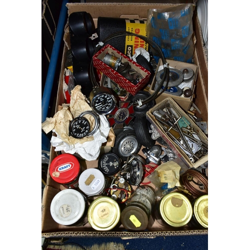 602 - A BOX OF ASSORTED SPARE CAR RELATED AND MODEL CAR SPARE PARTS ETC, to include an unused Peco exhaust... 