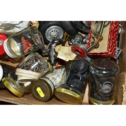 602 - A BOX OF ASSORTED SPARE CAR RELATED AND MODEL CAR SPARE PARTS ETC, to include an unused Peco exhaust... 