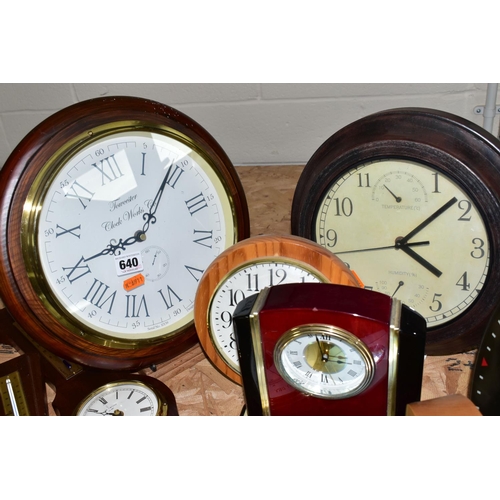 640 - A GROUP OF CLOCKS AND BAROMETERS, to include wall, mantel and alarm clocks, a Royal Air Force Spitfi... 