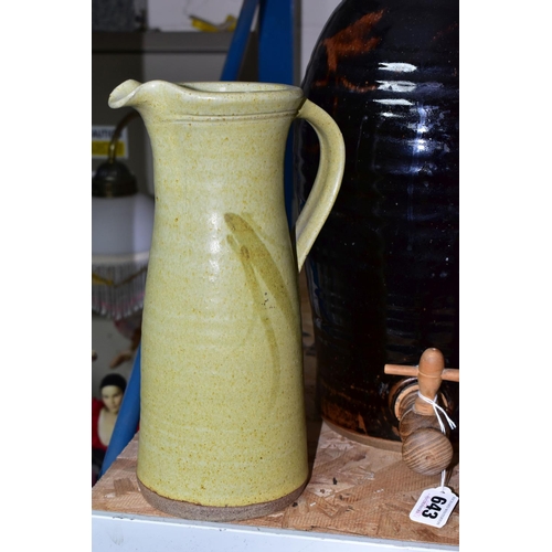 643 - A GROUP OF STUDIO POTTERY, to include a brown glazed cider flagon, height 44cm, with four matching g... 