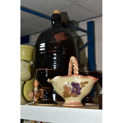 643 - A GROUP OF STUDIO POTTERY, to include a brown glazed cider flagon, height 44cm, with four matching g... 