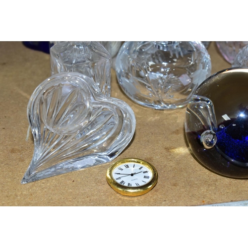 644 - A GROUP OF COLOURED AND DECORATIVE GLASS WARES, to include a Caithness Moonflower paperweight, a box... 