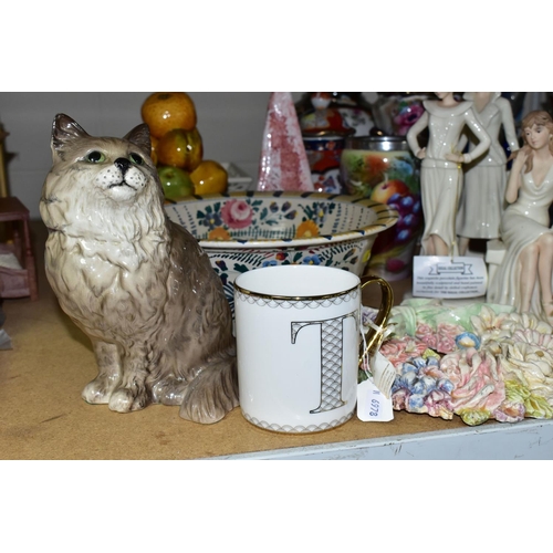 645 - A GROUP OF CERAMICS, to include a Beswick model no 1867 - a grey-brown Persian cat, seated, looking ... 