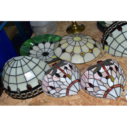 653 - A GROUP OF GLASS LIGHTSHADES, LIGHT FITTINGS AND AN OIL LAMP, comprising three leaded glass ceiling ... 