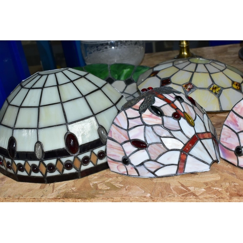 653 - A GROUP OF GLASS LIGHTSHADES, LIGHT FITTINGS AND AN OIL LAMP, comprising three leaded glass ceiling ... 