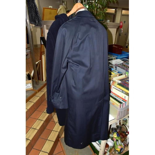 668 - A GENTLEMAN'S  CLASSIC BURBERRY RAINCOAT, in navy blue, signature check lining with a detachable 100... 