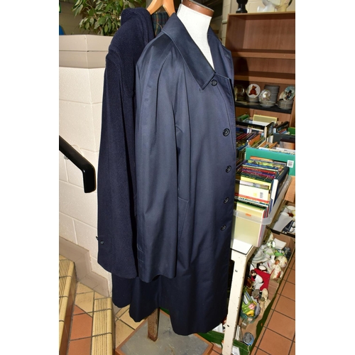 668 - A GENTLEMAN'S  CLASSIC BURBERRY RAINCOAT, in navy blue, signature check lining with a detachable 100... 