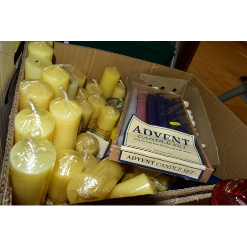 699 - TWO BOXES OF OVER FIFTY CANDLES, to include 70 hour Church candles, coloured candles, white candles,... 