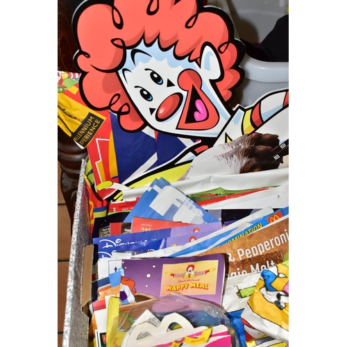 735 - FOUR BOXES OF MCDONALDS HAPPY MEAL TOYS AND ADVERTISING ITEMS, to include sealed packs, incomplete s... 