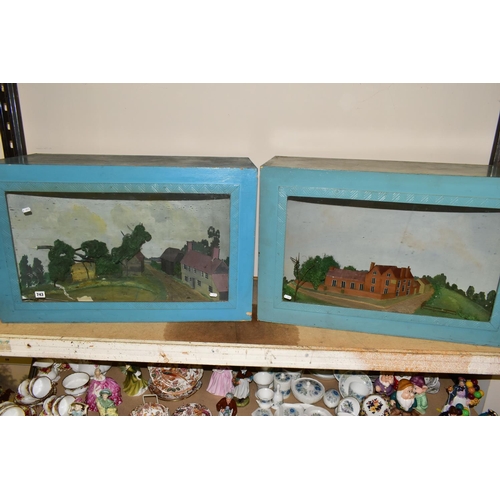 743 - TWO MID 20TH CENTURY WOOD AND GLASS CASED DIORAMAS, one containing a model of a house with several o... 