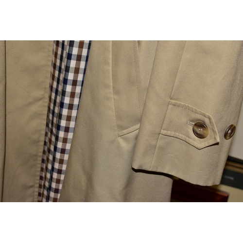 754 - A LADIES AQUASCUTUM CLASSIC RAINCOAT, with classic Aquascutum check lining, size 16 (1) (Condition r... 