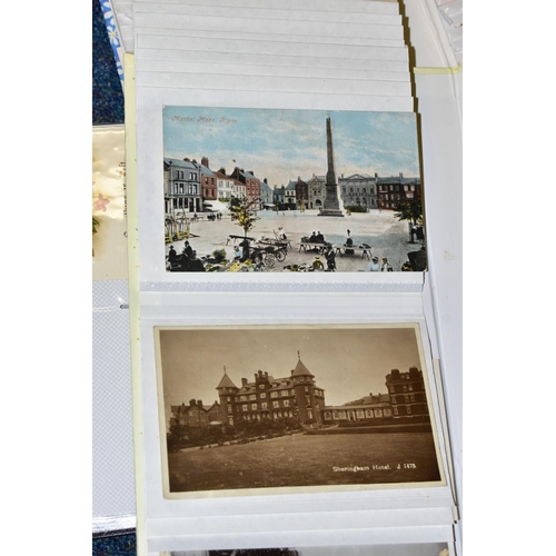 756 - POSTCARDS, nine albums containing approximately 430 Postcards dating from the Edwardian era predomin... 