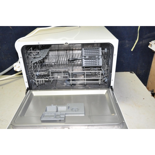 1062 - AN INDESIT TABLE TOP DISHWASHER, width 55cm x depth 51cm x height 44cm (PAT pass and working)