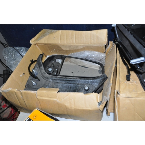 1067 - THREE BOXES CONTAINING POSSIBLY NEW CAR PARTS, including a Transit 13 passenger wing mirror assembly... 