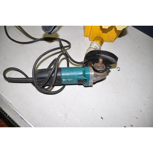 1074 - A MAKITA 9557NBR 110V ANGLE GRINDER missing two disc nuts) and a 110 volt transformer (2) ( PAT pass... 