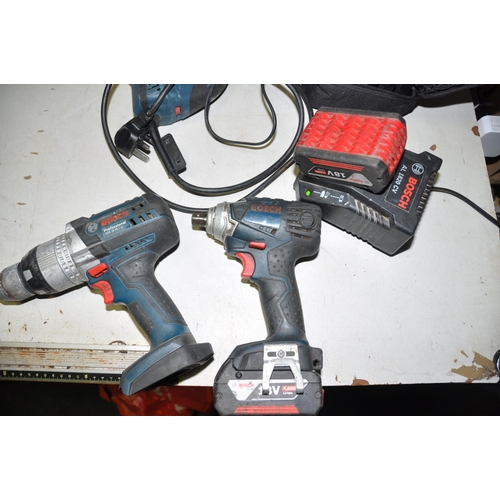 1077 - A BOSCH GSB18VE-2-LI 18V DRILL, a Bosch 18v Impact driver, two batteries and charger, a Ring Battery... 